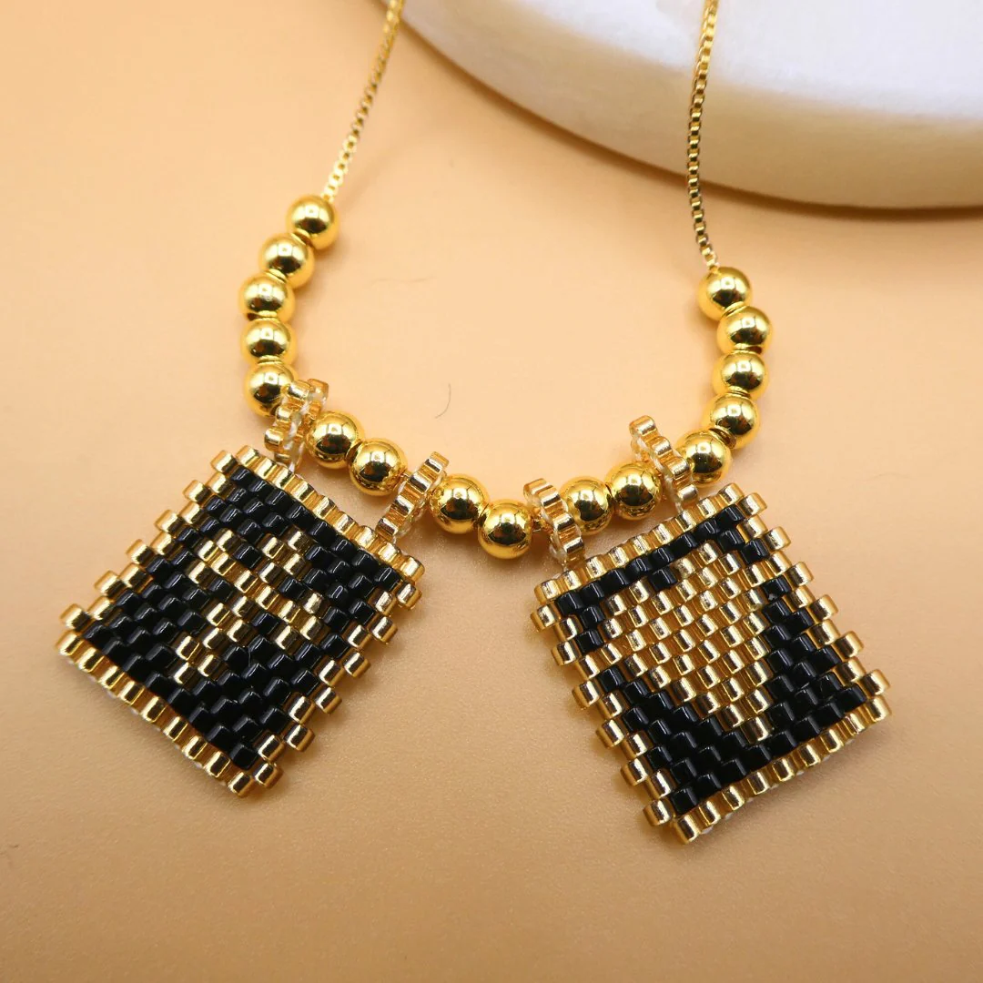 Gold-Plated Black Miyuki Necklace with Cross and Heart Charms 18-inch - Image 3